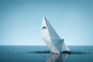a graphic render of a paper boat sinking