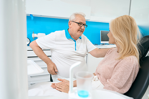 dentist talking with patient about case acceptance